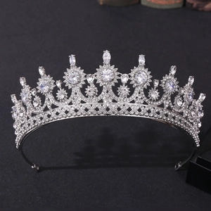 Detailed close-up of a silver bridal crown featuring round and marquise-cut zircons