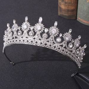 Sparkling silver bridal crown with marquise zircon stones on dark elegant background