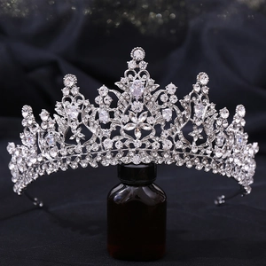 Detailed close-up of a luxury bridal crown with 3A zircons and silver alloy floral design