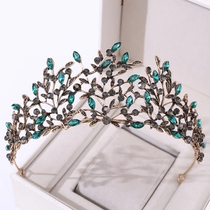 Vintage Baroque crown with antique bronze leaves and emerald green rhinestones in a white box