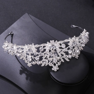 Silver bridal tiara with sparkling crystal rhinestones and delicate leaf floral design