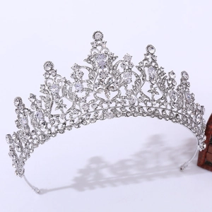 Close-up of sparkling silver bridal crown with 3A zircon floral pattern and metal details