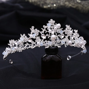 Silver bridal princess crown with white pearls and sparkling rhinestones for wedding