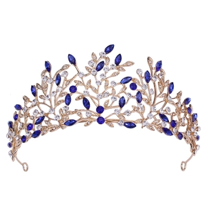 Elegant gold leaf bridal tiara with royal blue marquise crystals and clear rhinestones