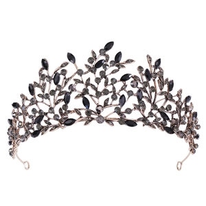 Detailed view of Baroque vintage leaf crown featuring black crystals and antique bronze alloy