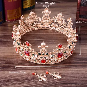 Baroque bridal jewelry set detail with red crystal crown and earrings on vintage desk
