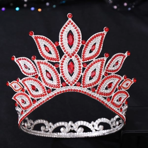 Close-up of Baroque crown with red marquise rhinestones and silver-plated hollow metalwork