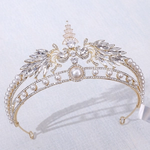 Detailed macro view of the luxury bridal tiara with golden alloy, pearls and AAA zircons