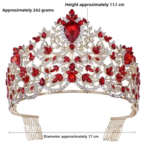 Detailed macro view of Baroque gold tiara with red crystals and side hair combs