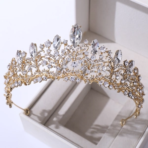 Detailed view of luxury rose gold bridal crown with shimmering rhinestones and crystals