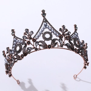 Detail of baroque black leaf crown with grey pearls and crystals on bronze metal frame