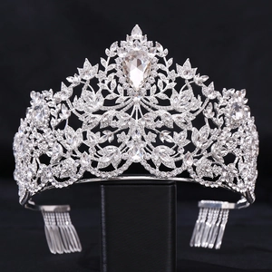 Detailed macro view of silver wedding crown with pear-cut crystal and rhinestones