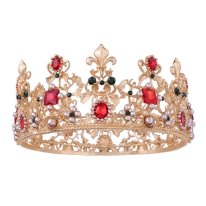 Baroque gold bridal crown with red gemstones, green crystals and pearls for wedding
