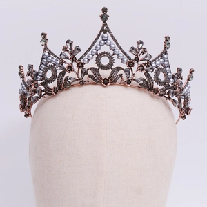 Vintage rose gold leaf crown with dark grey crystals and pearls for bridal hair