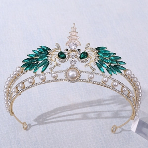 Luxurious European bridal crown with emerald crystals, pearls, and white zircons