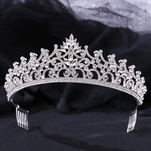Detailed macro view of silver tiara with marquise rhinestones and side combs