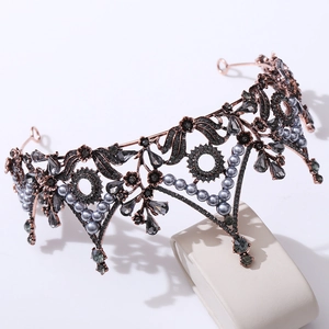 Vintage Baroque black crown with crystals, grey rhinestones and pearls on a white stand