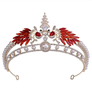 Macro shot of red crystal peacock wedding tiara with gold finish and white pearls