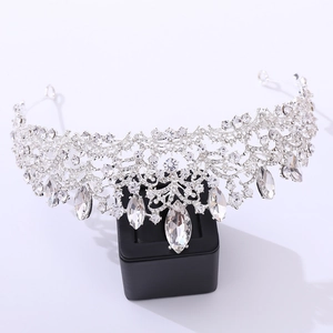 Detailed macro view of luxury bridal tiara featuring shimmering crystals and rhinestones