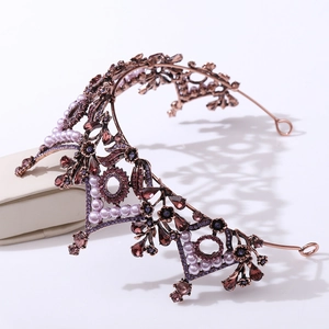 Vintage bronze tiara with purple crystals and pearls in an elegant leaf and flower design