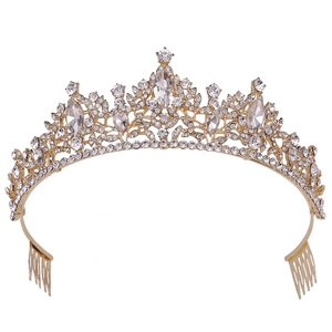 Detail of leaf pattern bridal crown with marquise rhinestones and golden combs