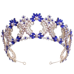 Baroque bridal crown with blue gems and pink pearls on a gold-plated alloy frame