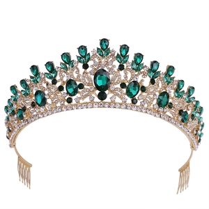 Baroque bridal crown with green crystals and gold leaf details for wedding hair decoration