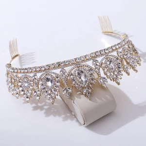 Elegant gold bridal tiara with sparkling crystals and side combs for weddings