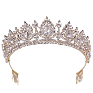 Detail of a bridal crown featuring pear-shaped crystals and gold alloy comb structure