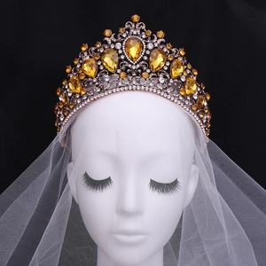 Couronne baroque or rose avec cristaux ambre et pierres en goutte sur voile