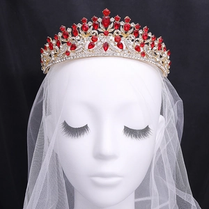 Vintage European gold bridal crown with red gemstones and white sparkling rhinestones