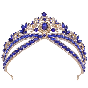 Luxury gold bridal crown with deep blue crystals and rhinestones for wedding banquets