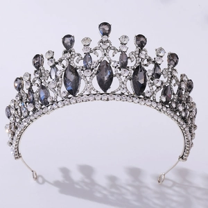 Detail of baroque bridal crown with grey crystals and silver metal craftsmanship