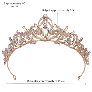 Close-up of golden bridal tiara detailing intricate leaf alloy and colorful AB rhinestones