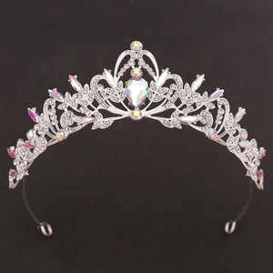 Detail of bridal tiara with sparkling silver leaves and colorful rhinestones on black back