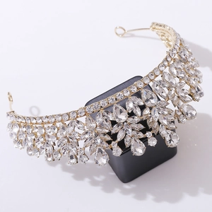 Exquisite golden bridal crown with rhinestone leaves and sparkling crystals for weddings
