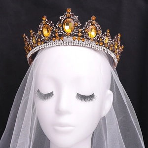 Baroque vintage bridal crown with amber stones and white crystals on lace veil model