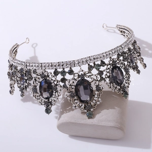 Macro detail of Baroque bridal crown with dark grey gemstones and rhinestones