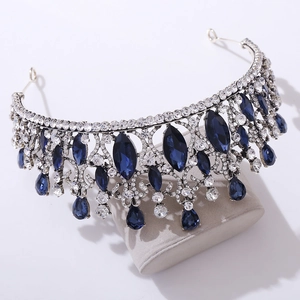 Detailed macro view of vintage bridal crown with dark blue crystals and silver rhinestones