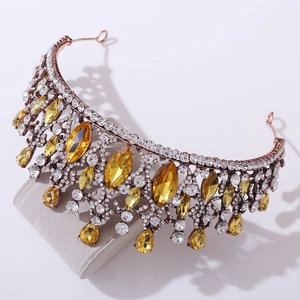 Detail of rose gold Baroque crown featuring amber crystals and white rhinestones
