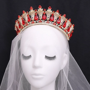Baroque gold bridal crown with red teardrop rhinestones and sparkling crystal accents