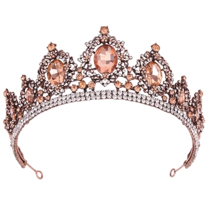 Detail of baroque crown featuring champagne oval gemstones and white rhinestones
