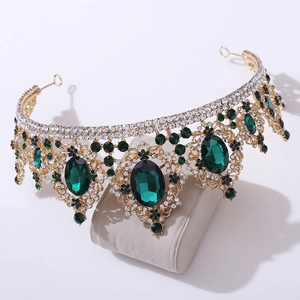 Baroque bridal crown with gold alloy setting, clear rhinestones and deep green gemstones