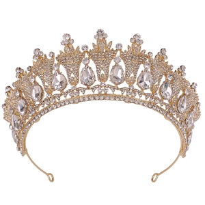 Detailed view of luxury bridal crown featuring large teardrop crystals and gold alloy base