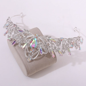 Close-up of bridal crown featuring leaf design and shimmering crystal rhinestones