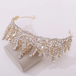 Close-up of golden Baroque bridal crown with clear crystals and wheat ear details