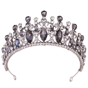 Detailed close-up of Baroque vintage silver bridal crown with grey crystals and rhinestones