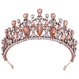 Macro view of Baroque vintage bridal crown with champagne crystals and rose gold alloy