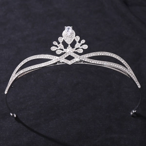 Elegant silver zircon bridal crown tiara with central water drop crystal on black background
