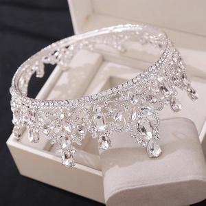 Macro shot of silver baroque tiara with crystal embellishments and rhinestone details